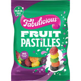 Colorful gummy fruit pastilles in a family bag, featuring orange, raspberry, lime, and grape flavors for sharing and enjoyment.