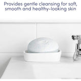 Dove Exfoliating Soap Bar, enriched with moisturizing cream and gentle beads, for soft, smooth, and revitalized skin.