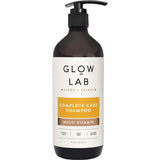 Glow Lab Shampoo Complete Care bottle featuring a multi-vitamin formula for nourishing, strengthening, and adding shine to hair.