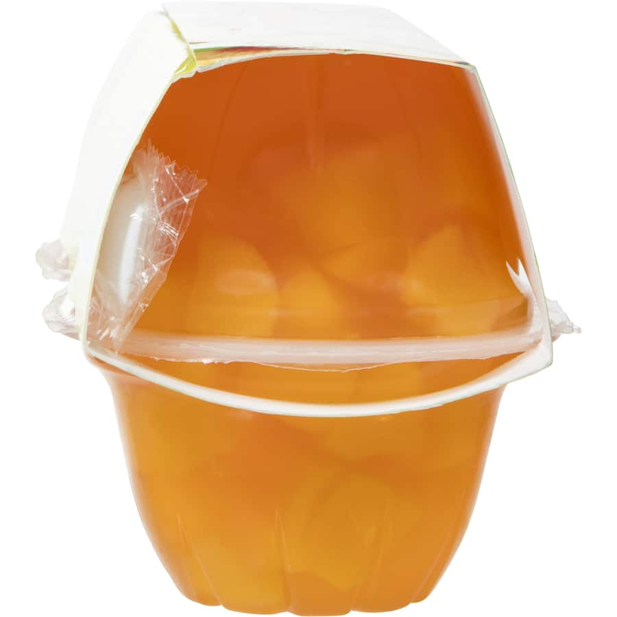 Woolworths Fruit Snack with succulent peaches in rich mango jelly, offering a naturally sweet treat for all ages.