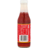 Trident Sweet Chilli Sauce bottle featuring Thai-inspired flavors for dipping, grilling, and enhancing various dishes.