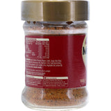 A glass shaker jar of Masterfoods Moroccan Seasoning featuring a blend of turmeric, paprika, and cumin for flavorful dishes.