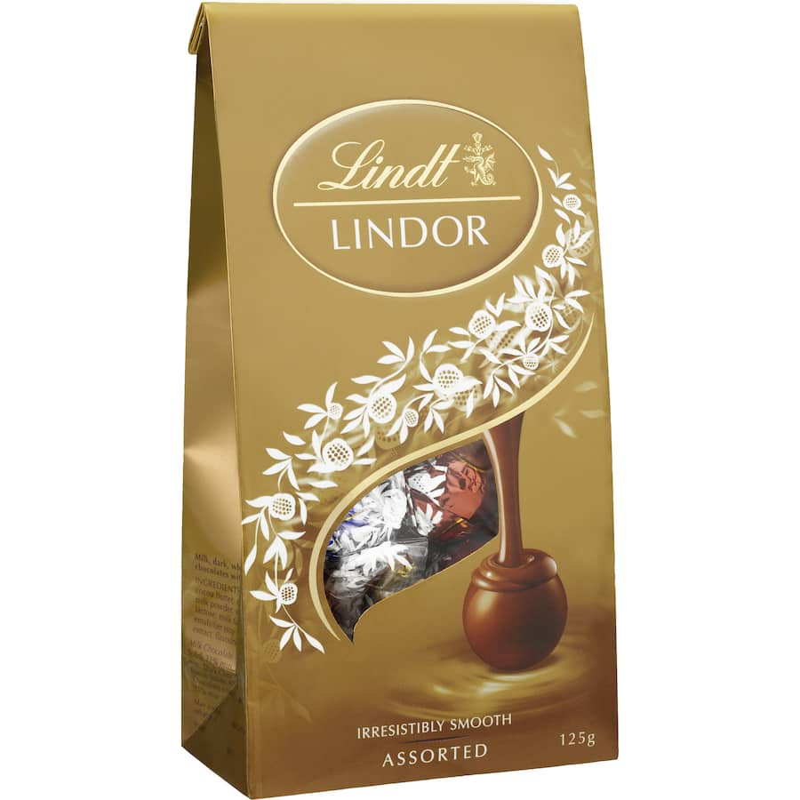 Assorted Lindt Lindor chocolates in a sharepack, featuring truffles of milk, dark, white, and hazelnut flavors.