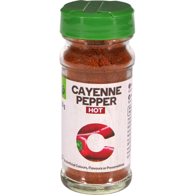 Woolworths Cayenne Pepper 30g spice jar for enhancing dishes with natural heat and bold flavor, ideal for meats and veggies.