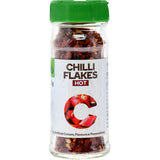 Woolworths Chilli Flakes in a 30g pack, adding intense heat and flavor to soups, stews, and marinades.