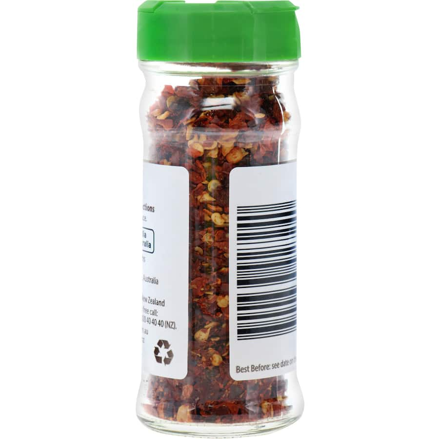 Woolworths Chilli Flakes in a 30g pack, perfect for adding intense heat and flavor to soups, stews, and marinades.