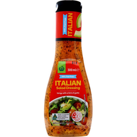 Woolworths 99% fat-free Italian dressing, a zesty blend with garlic, perfect for enhancing salads with authentic flavor.