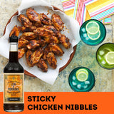 A bottle of Lea & Perrins Worcestershire Sauce, known for its rich, tangy flavor, perfect for enhancing various dishes.