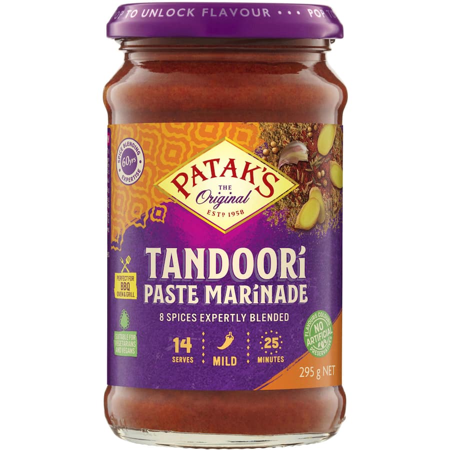 Patak's Tandoori Paste Marinade in a recyclable jar, featuring a blend of 8 aromatic spices for authentic Indian cooking.