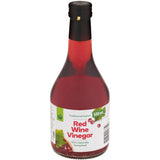 Woolworths Red Wine Vinegar in a 500ml bottle, crafted from Italian grapes, perfect for dressings and marinades.