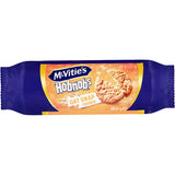 Crunchy McVities Hobnobs Oat Snap cookies with oats and honey, perfect for snacking with tea or coffee.