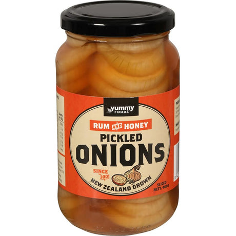 Tangy pickled onions infused with rum and honey, perfect for enhancing platters and snacks.