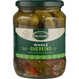 Delmaine Gherkins Whole, crunchy gourmet pickles with mustard seeds, perfect for enhancing sandwiches, salads, and sauces.