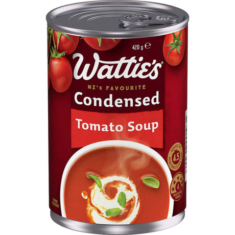 Wattie's Condensed Tomato Soup can, featuring rich flavor, versatility for meals, and 99% fat-free, wholesome ingredients.