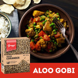 Ground coriander by Greggs, a nutty and citrus spice ideal for curries, soups, and marinades, enhances diverse dishes.