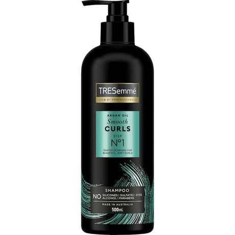 TRESemme Smooth Curls Shampoo with Argan Oil gently cleanses, nourishes, and defines frizz-prone curls for shiny, manageable hair.