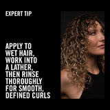 TRESemme Smooth Curls Shampoo with Argan Oil for soft, defined curls; free from silicones, sulfates, and parabens.