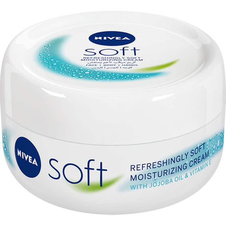 Nivea Soft Day Cream with Jojoba and Vitamin E in a compact pot, providing intense hydration for all skin types.