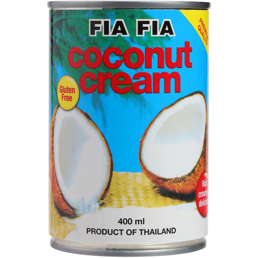 A jar of Fia Fia Coconut Cream showcasing its thick, creamy texture, ideal for various culinary uses, from curries to desserts.