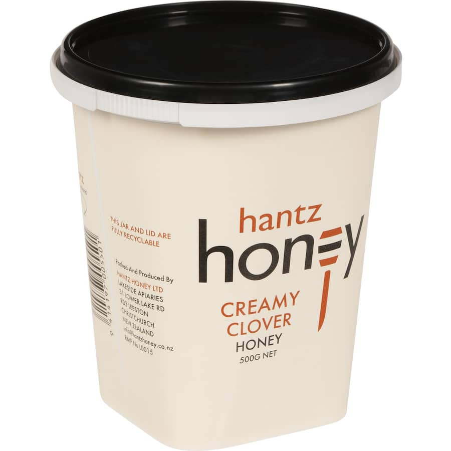 Hantz Creamed Honey in a jar, showcasing its smooth, pale texture, ideal for spreading and enhancing culinary delights.