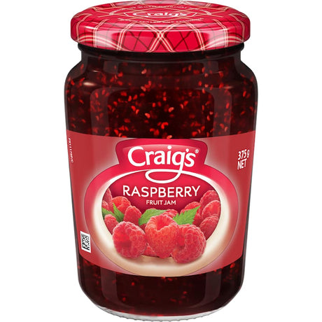 Vibrant jar of Craig's Raspberry Fruit Jam, showcasing rich color and no artificial ingredients, perfect for sweet and tart breakfasts.