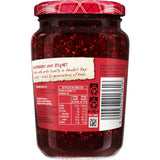 Craig's Raspberry Fruit Jam in a jar, featuring vibrant color and a label promoting natural ingredients and sweet-tart flavor.