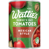 A can of Wattie's Flavoured Tomatoes Mexican Style with diced tomatoes, jalapeños, and spices for vibrant Mexican dishes.