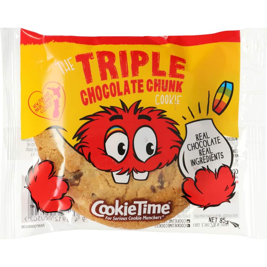 Decadent triple chocolate cookie featuring chunks of dark, milk, and white chocolate for a luxurious treat.