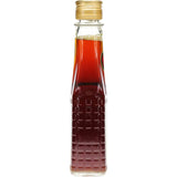 O Canada Maple Syrup bottle, pure and gluten-free, showcasing its rich golden color and versatile culinary uses.