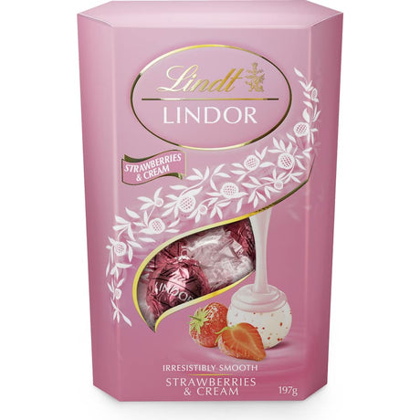 Lindt Lindor Strawberries & Cream Chocolate Box featuring white chocolate with smooth strawberry cream filling, ideal for gifts.