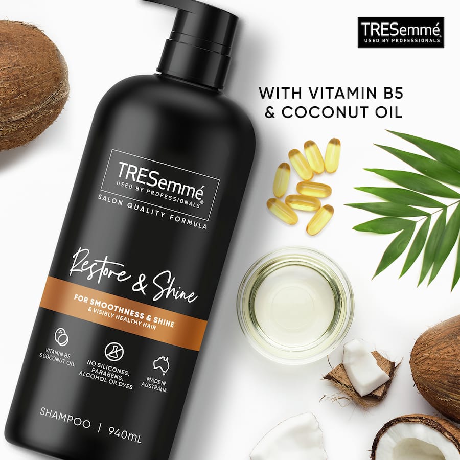 Tresemme Shampoo Restore & Shine bottle, enriched with Vitamin B5 and coconut oil for smooth, shiny, healthy hair.