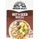 A bowl of Orchard Valley Muesli Nuts & Seeds, featuring almonds, cashews, and pumpkin seeds mixed with oats for a nutritious breakfast.