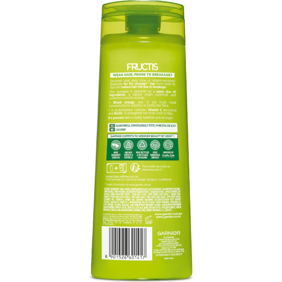 Nourishing Garnier Fructis shampoo revitalizes weak hair, promoting strength and shine with vitamins and natural ingredients.