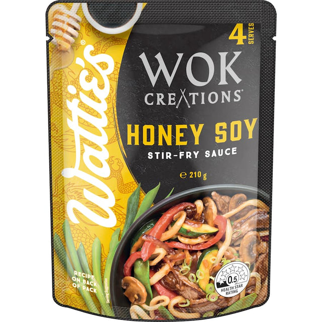 Watties Wok Creations Honey Soy Stir-fry Sauce bottle showcasing its honey, soy, and sesame oil flavors for delicious meals.