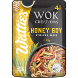 Watties Wok Creations Honey Soy Stir-fry Sauce, infused with honey, soy, and ginger, perfect for easy, flavorful stir-fries.