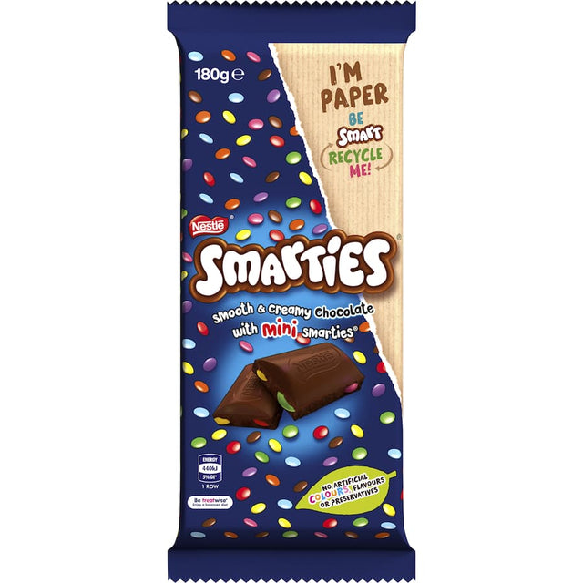 Colorful Nestle Smarties chocolate block, featuring crunchy candy-coated pieces in creamy milk chocolate, sustainably sourced.