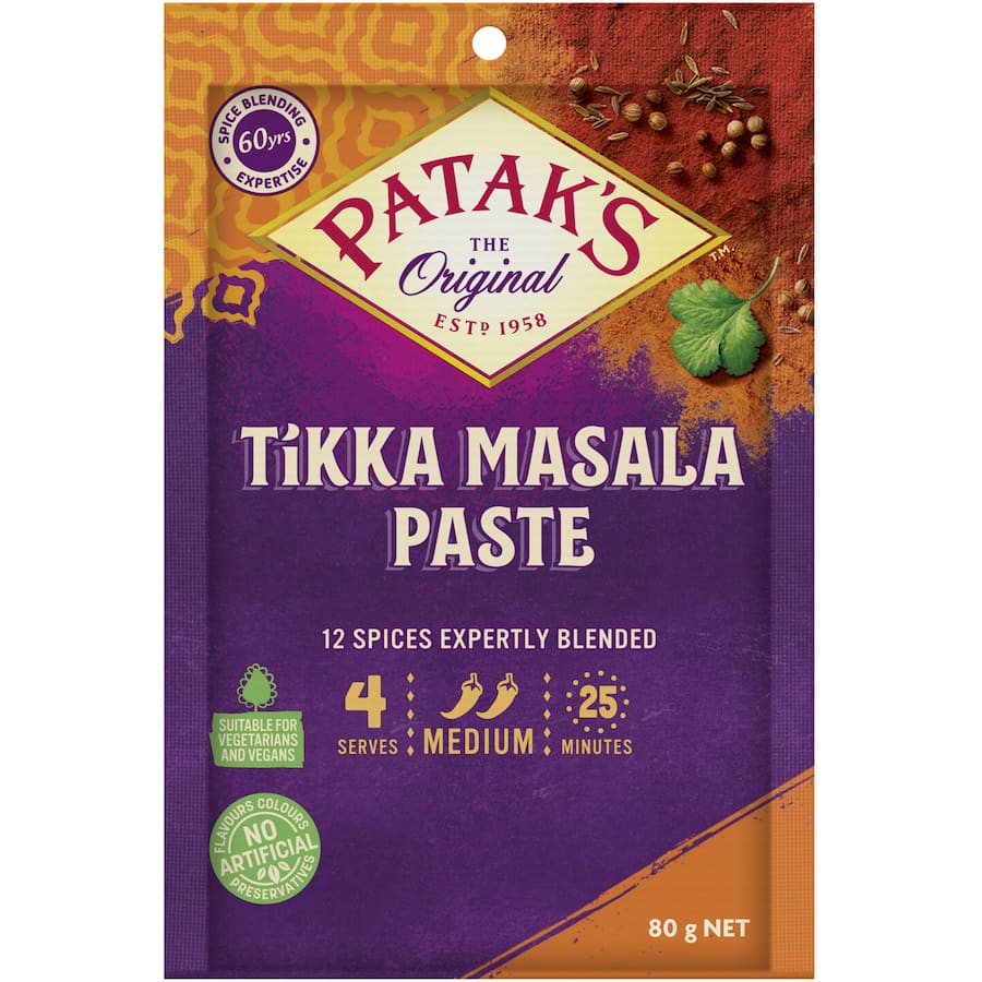 Patak's Tikka Masala Curry Paste, a vegetarian-friendly blend of 11 spices and tomatoes for authentic medium-spicy dishes.