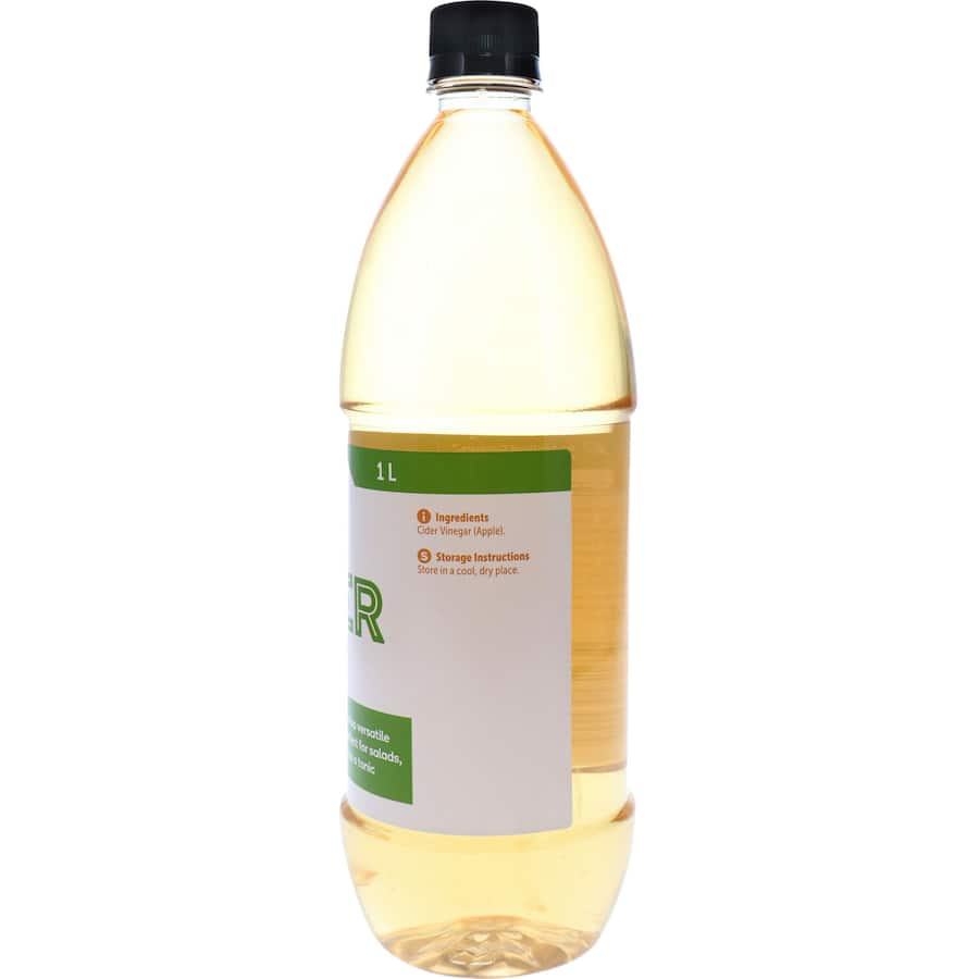 Woolworths Apple Cider Vinegar in a 1L bottle, showcasing 100% pure vinegar for health benefits and versatile cooking uses.