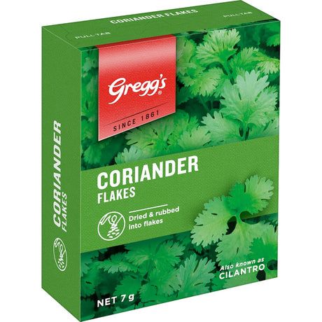 Greggs Coriander Flakes in a glass container, showcasing dried, aromatic flakes ideal for enhancing Asian and Mexican dishes.