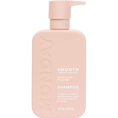 Nourishing shampoo for curly, wavy, and frizzy hair with Shea Butter, Coconut Oil, and Vitamin E for hydration and shine.