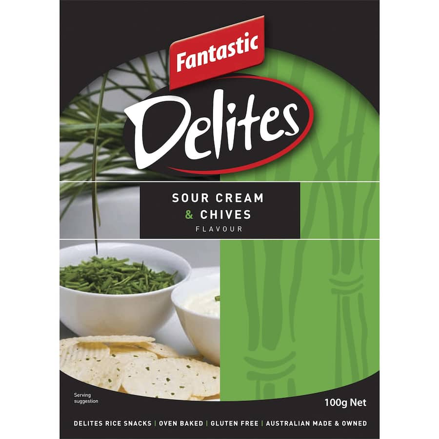 Crunchy Fantastic Delites Rice Crackers in Sour Cream & Chives flavor, gluten-free and baked for a light, delicious snack.