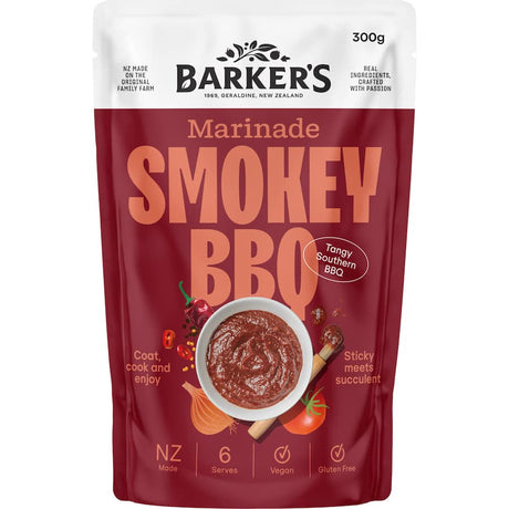 A bottle of Barker's BBQ Sauce Marinade Smokey, perfect for adding rich, smoky flavor to meats and veggies.