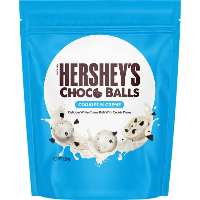 Hershey's Choco Balls Cookies N Creme, creamy white chocolate-coated treats with crunchy cookie pieces inside.