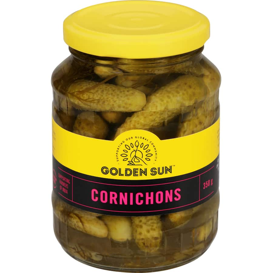 Golden Sun Cornichons: Crunchy gluten-free baby gherkins ideal for enhancing platters, sandwiches, and sauces sustainably sourced from India.