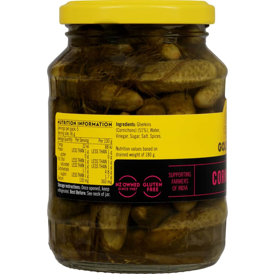 Golden Sun Cornichons, gluten-free baby gherkins adding crunch and flavor to meals, sourced sustainably from Indian farmers.