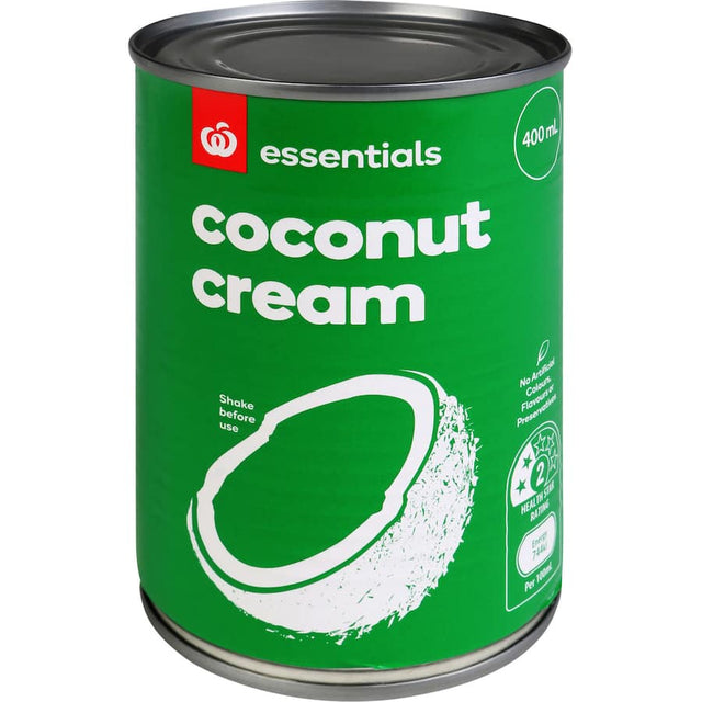 A jar of Essentials Coconut Cream, perfect for rich curries and desserts, made from 100% natural coconuts.