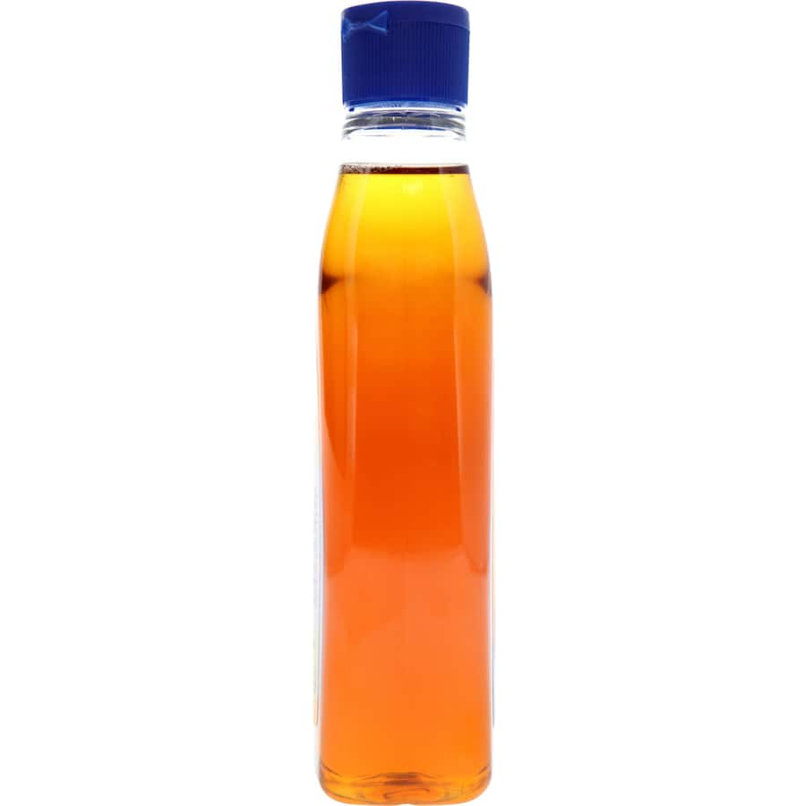 Chelsea Honey & Maple Syrup Flavoured Syrup, a rich blend perfect for pancakes, waffles, fruit, and yogurt toppings.