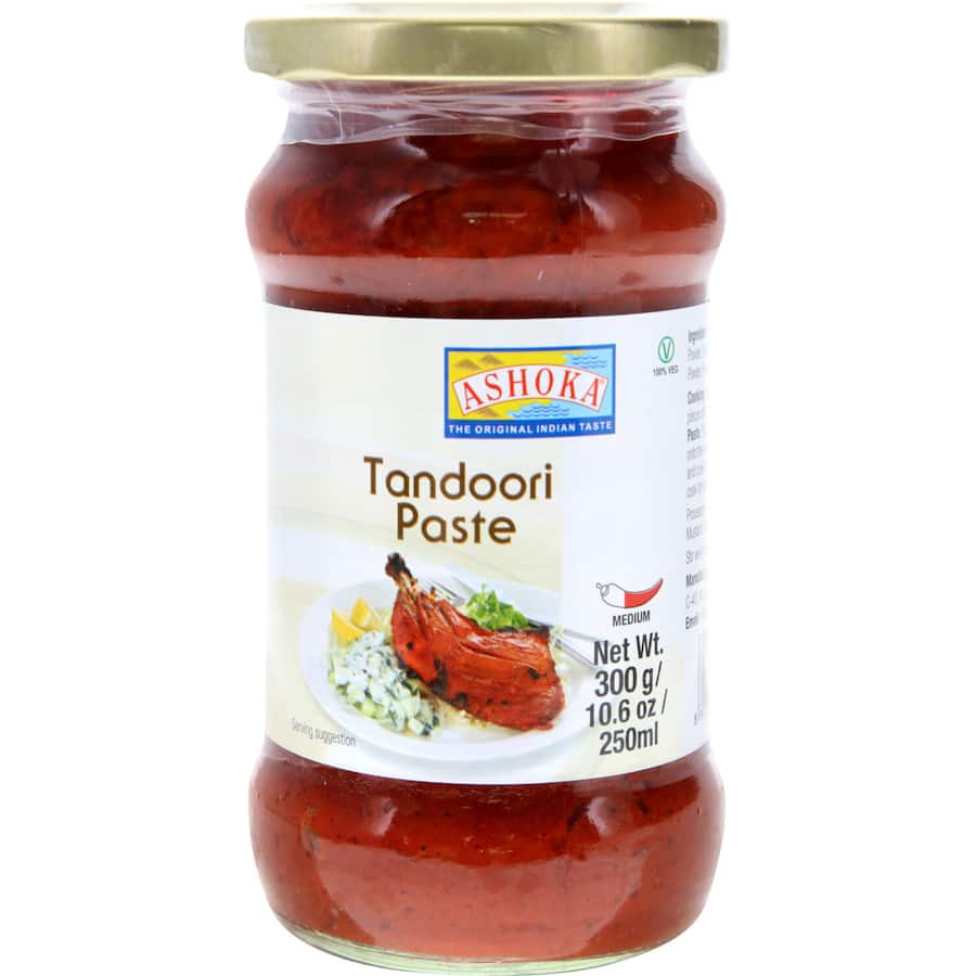 Ashoka Indian Tandoori Paste jar showcasing authentic Indian flavors for marinating meats and vegetables, medium spice level.