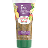 A vibrant jar of Thai herb seasoning featuring lemongrass, ginger, coriander, and chili for authentic dishes.