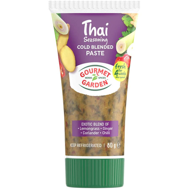 A vibrant jar of Thai herb seasoning featuring lemongrass, ginger, coriander, and chili for authentic dishes.